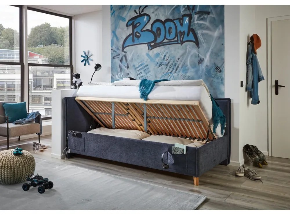 Тъмносиньо тапицирано ъглово детско легло 90x200 cm с място за съхранение с включена подматрачна рамка Fun – Meise Möbel