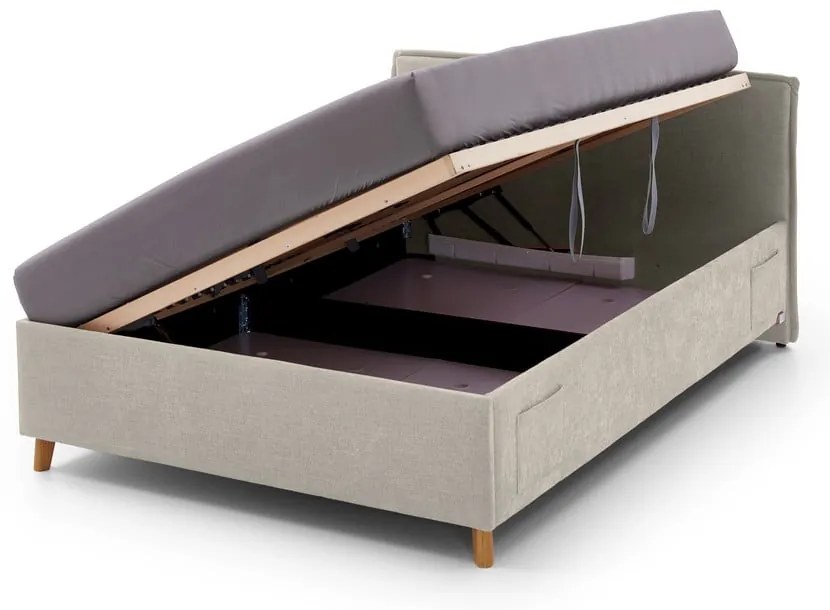 Бежово тапицирано детско легло 140x200 cm с място за съхранение с включена подматрачна рамка Fun – Meise Möbel