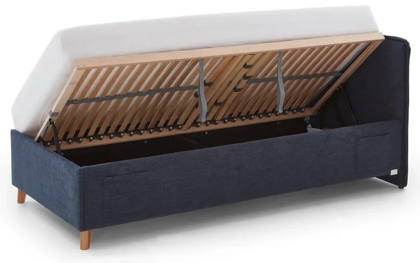 Тъмносиньо тапицирано детско легло 90x200 cm с място за съхранение с включена подматрачна рамка Fun – Meise Möbel