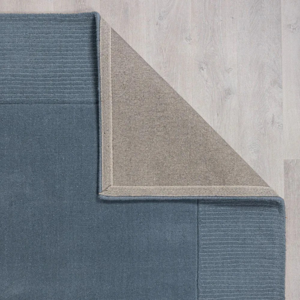 Тъмносин ръчно изработен вълнен килим 200x290 cm Textured Wool Border – Flair Rugs