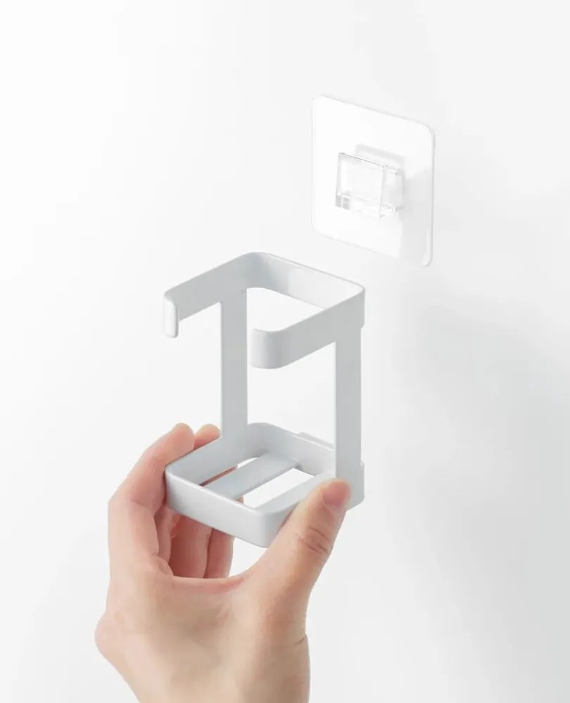Бял метален държач за устройство за грижа за кожата Film Hook – YAMAZAKI