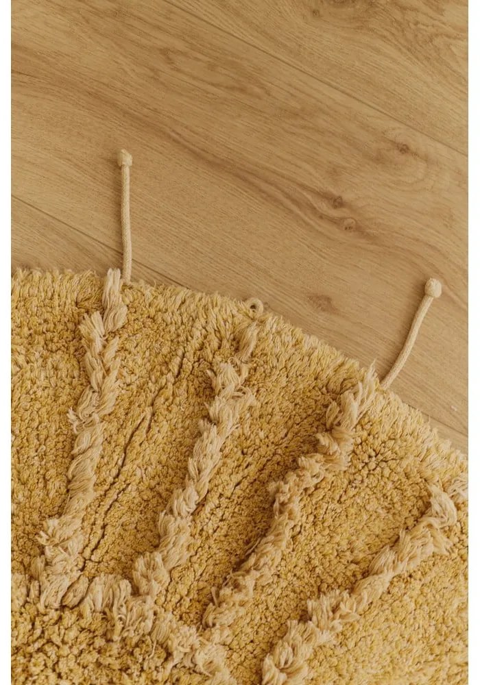 Ръчно изработен памучен кръгъл килим подходящ за пране в цвят горчица ø 100 cm Solar Multishape – Lorena Canals