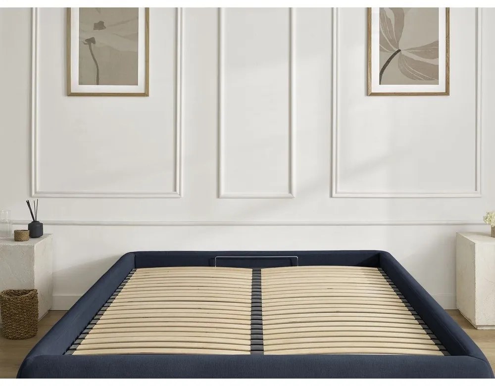 Тъмносиньо тапицирано двойно легло без табла с място за съхранение и включена подматрачна рамка 180x200 cm Inera – Bobochic Paris