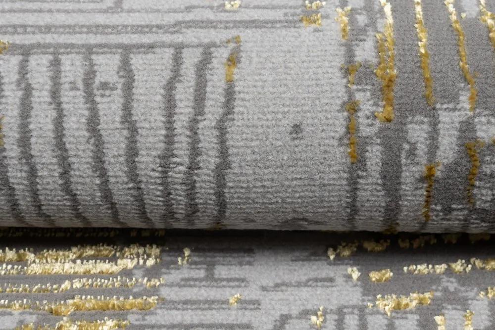 Модерен сив килим със златен мотив Ширина: 80 см | Дължина: 150 см