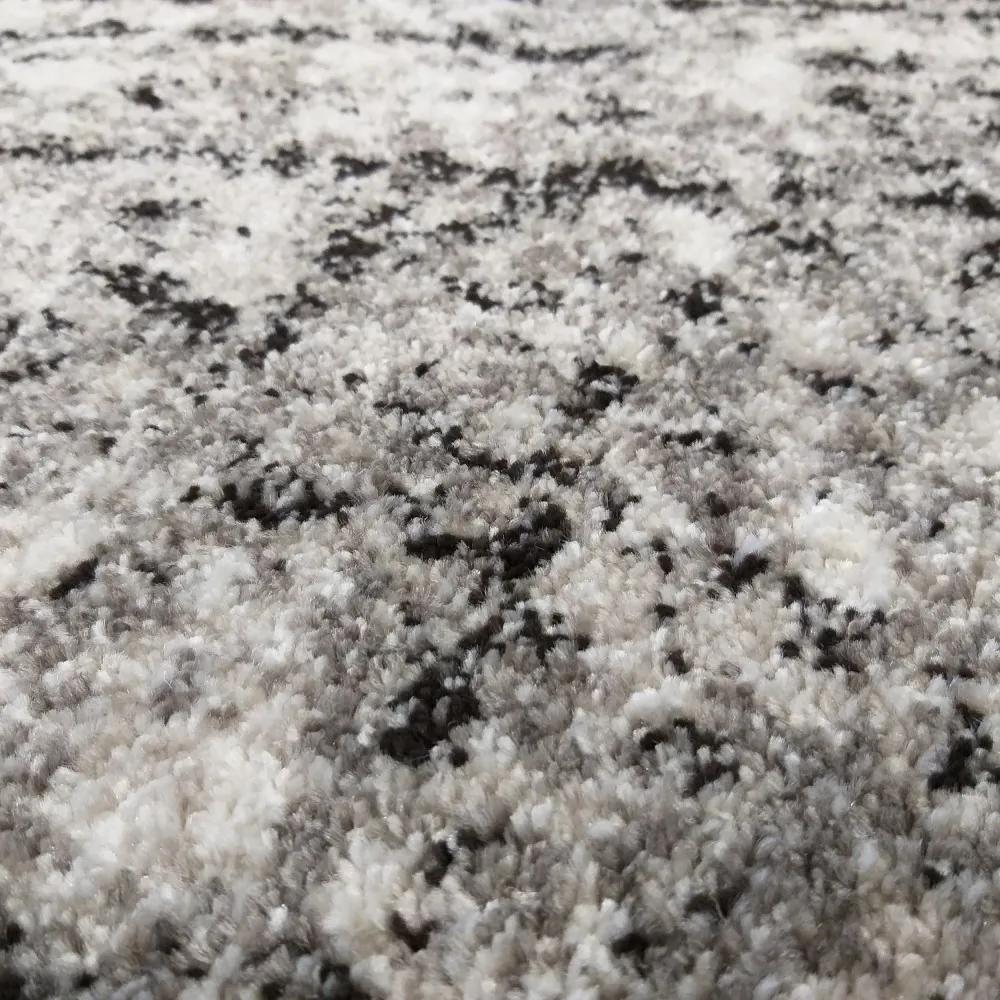 Стилен кафяв килим с мотив, напомнящ мрамор Ширина: 60 ​​см | Дължина: 100 см