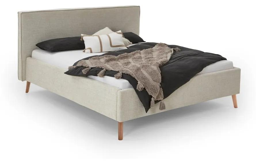Кремаво тапицирано двойно легло с място за съхранение с включена подматрачна рамка 180x200 cm Riva – Meise Möbel