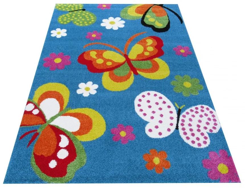Син детски килим с пеперуди Ширина: 120 см | Дължина: 170 см
