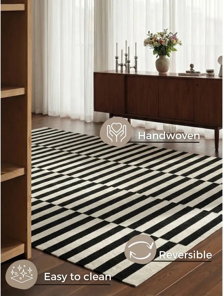 Черно-бял двустранен ръчно изработен вълнен килим 200x300 cm Donna – Hanse Home