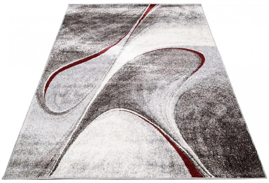 Модерен килим в кафяви нюанси с абстрактна шарка Ширина: 140 см | Дължина: 200 см