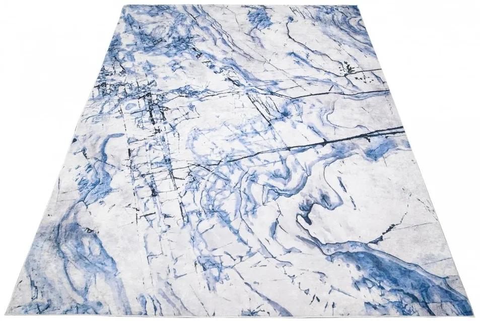 Обикновен бял и син килим с абстрактен модел Ширина: 120 см | Дължина: 170 см