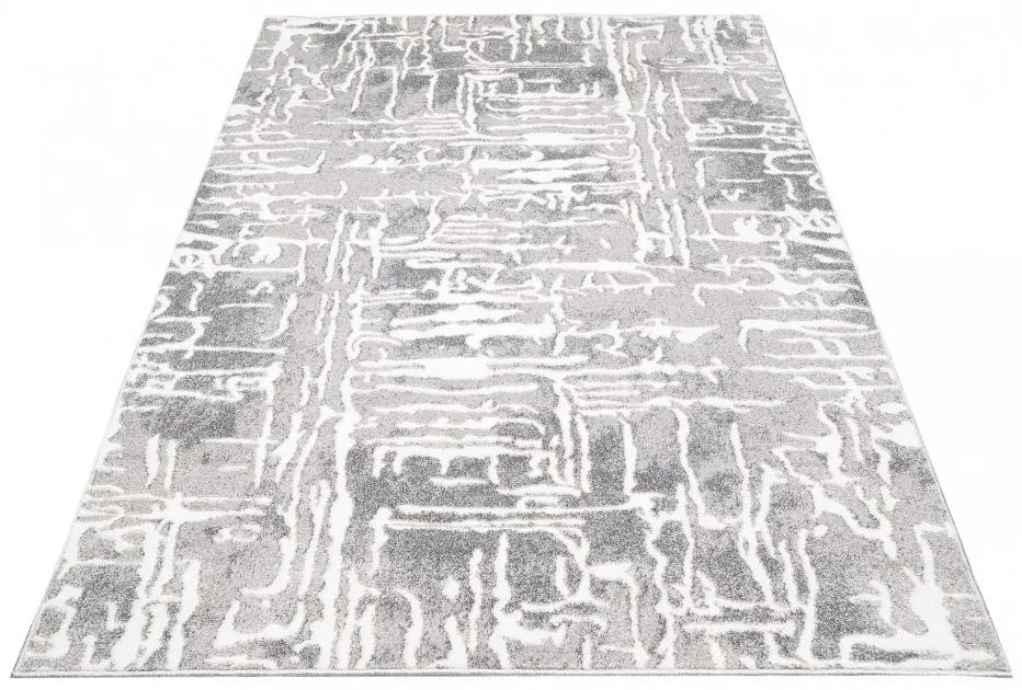 Сив дизайнерски килим с лек абстрактен модел Ширина: 120 см | Дължина: 170 см