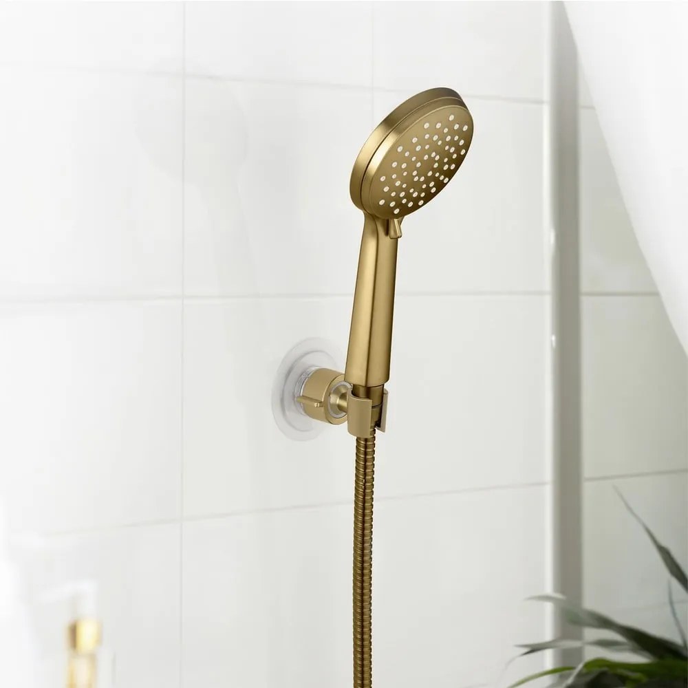 Пластмасов държач за душ слушалка без пробиване в златист цвят Libertà – Wenko