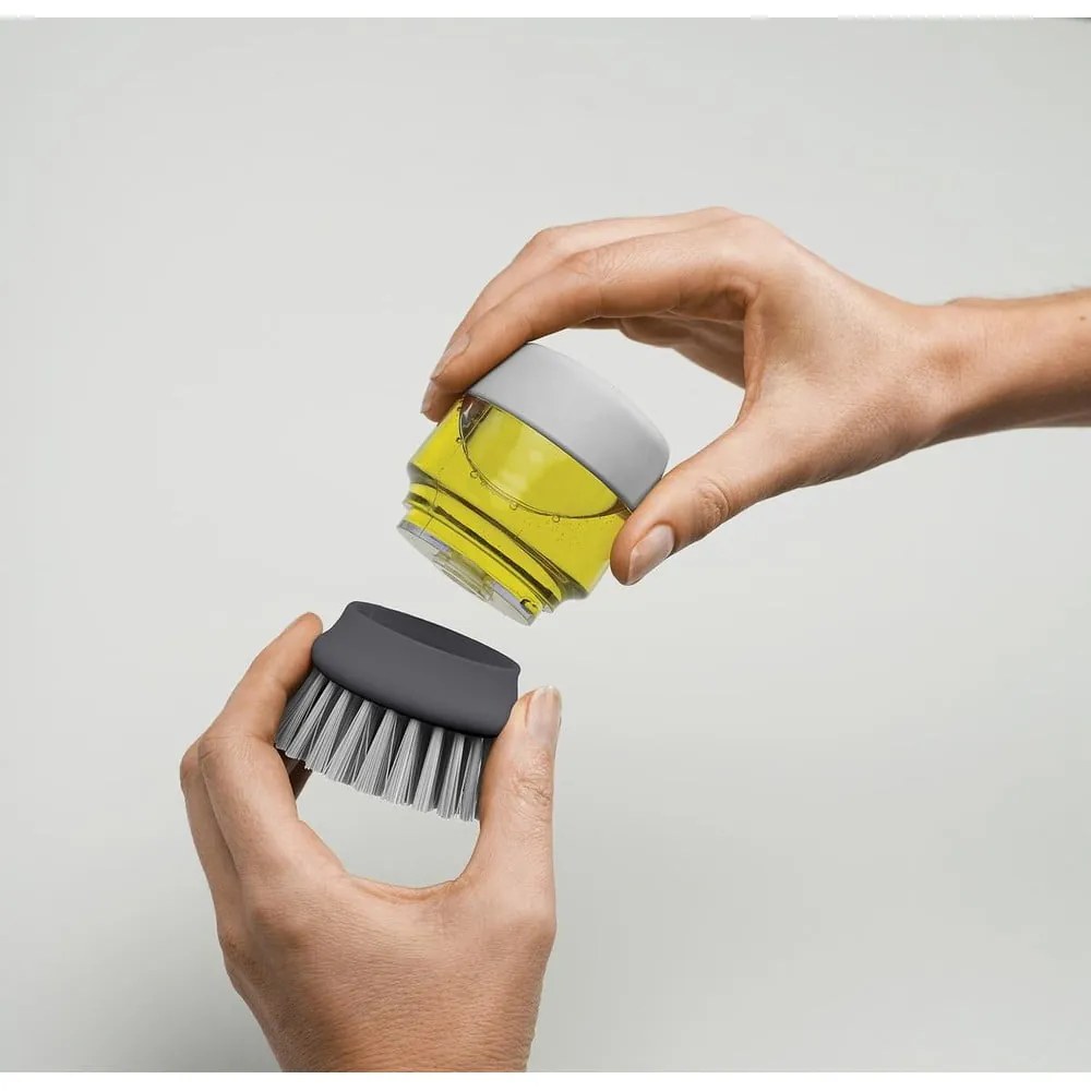 Сива четка с дозатор и стойка Palm Scrub - Joseph Joseph