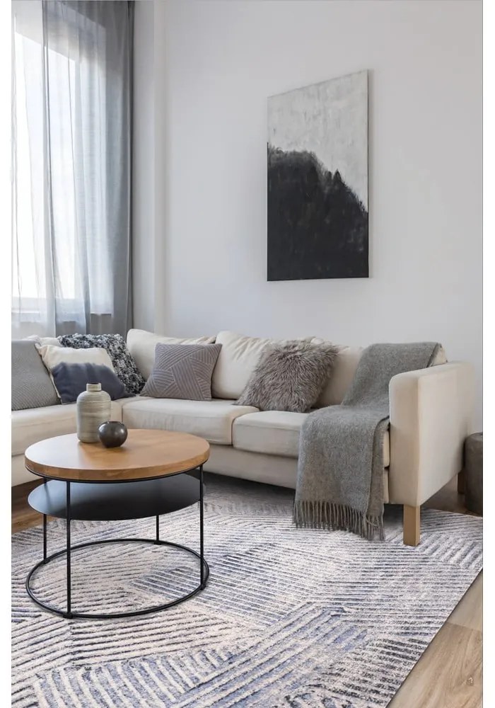 Светлосин вълнен килим 133x180 cm Strokes - Agnella