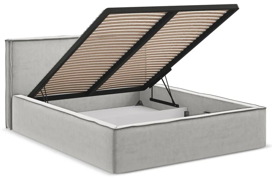 Светлосиво двойно тапицирано легло с място за съхранение и включена подматрачна рамка 140x200 cm Anani – Makamii