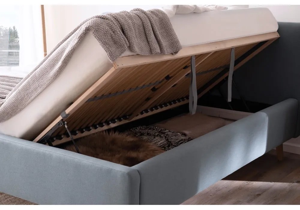 Сиво-синьо двойно легло 160x200 cm тапицирано с място за съхранение с включена подматрачна рамка Mattis – Meise Möbel