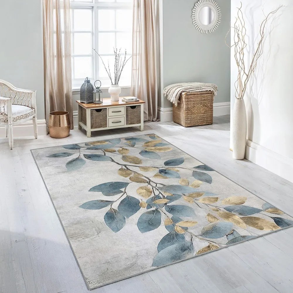 Светлосиньо-златист килим подходящ за пране 120x180 cm Golden Leaves – Mila Home