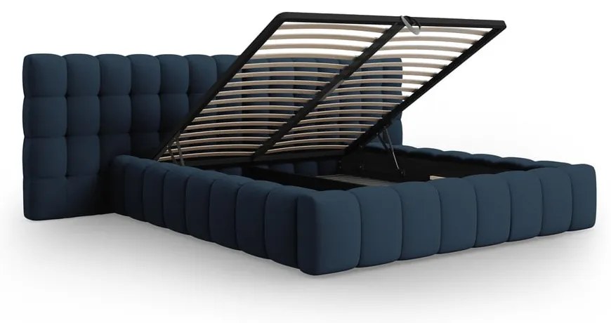 Тъмносиньо тапицирано двойно легло с място за съхранение с включена подматрачна рамка 180x200 cm Mamaia – Micadoni Home