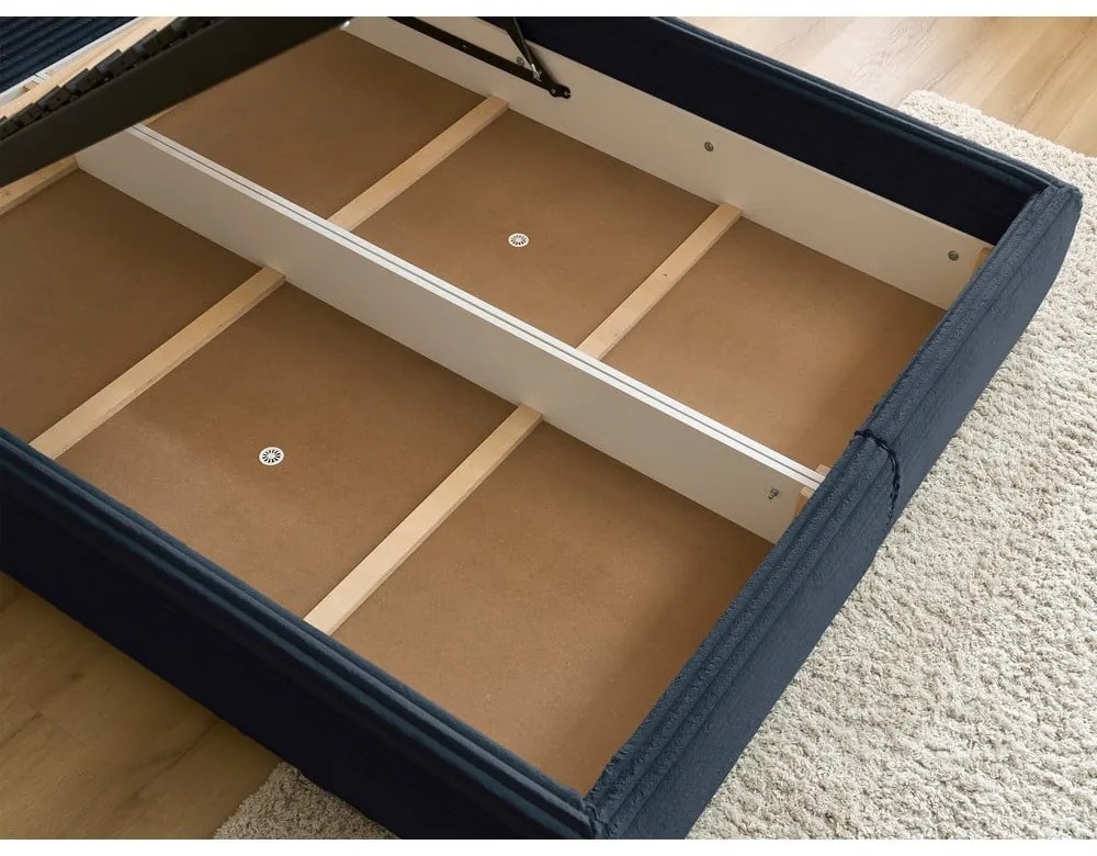 Тъмносиньо двойно тапицирано легло с място за съхранение с включена подматрачна рамка 160x200 cm Jade – Bobochic Paris