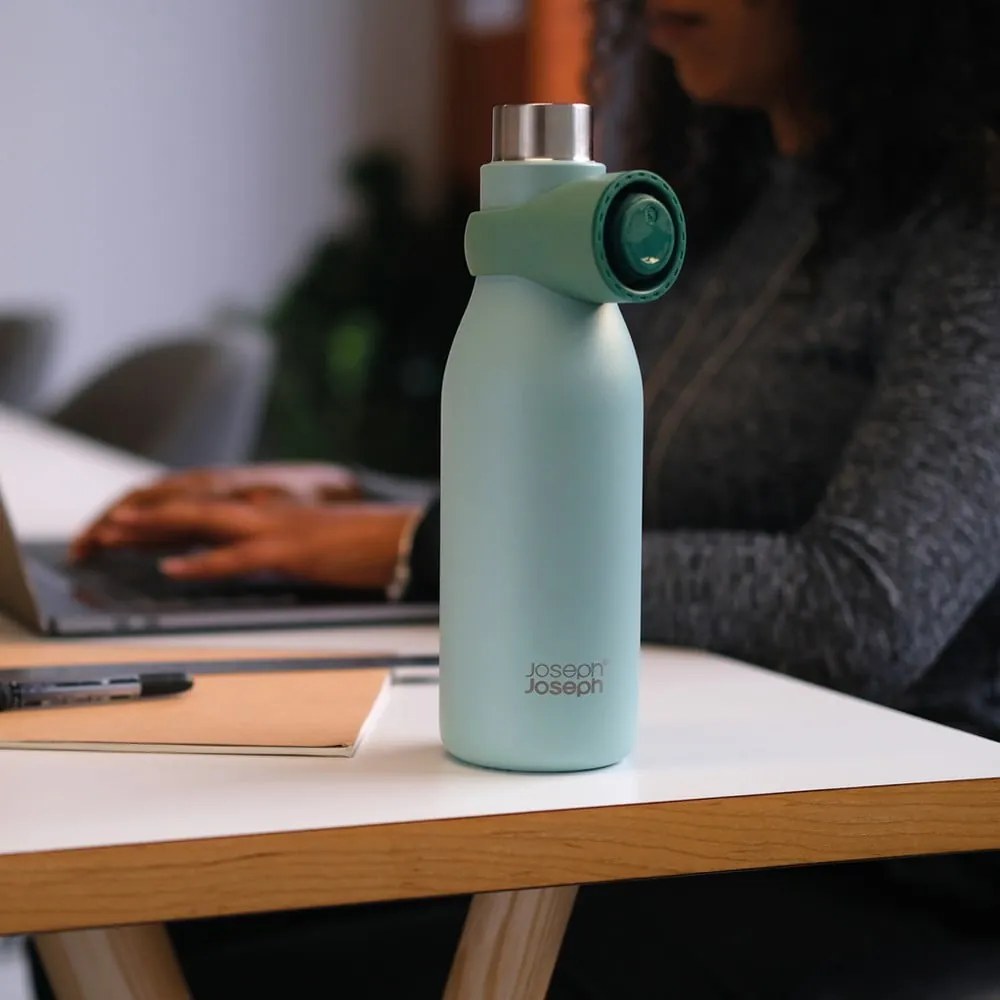Пътническа бутилка от неръждаема стомана в цвят мента 500 мл Loop - Joseph Joseph