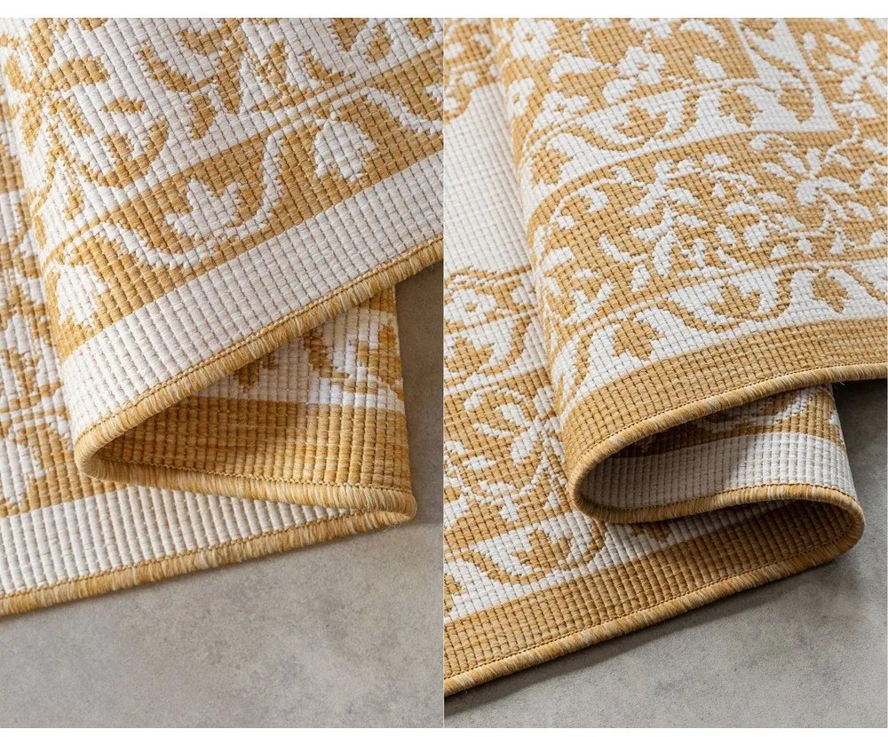 Външен килим в цвят жълта охра и кремаво 80x150 cm Gemini – Elle Decoration