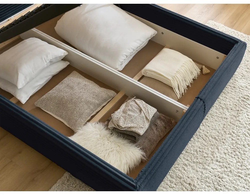 Тъмносиньо двойно тапицирано легло с място за съхранение с включена подматрачна рамка 160x200 cm Jade – Bobochic Paris