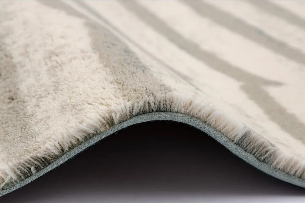 Бежов вълнен килим 133x190 cm Agnus Tides – Agnella