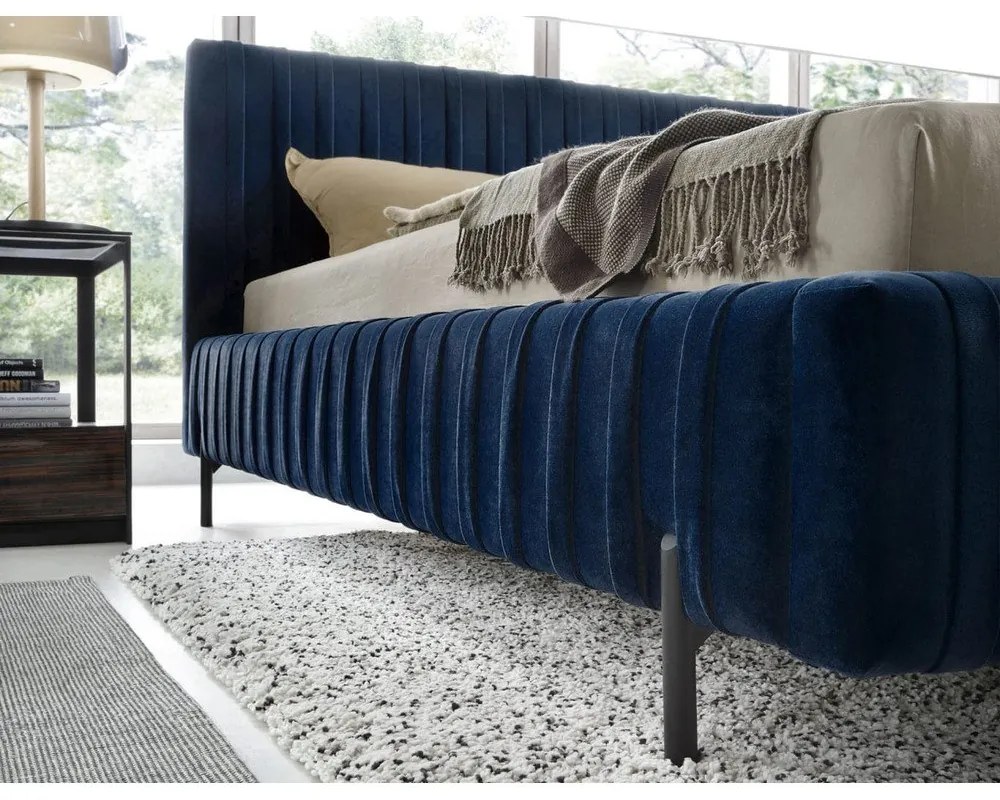 Тъмносиньо двойно тапицирано легло с място за съхранение и включена подматрачна рамка 180x200 cm Plissa – ELTAP