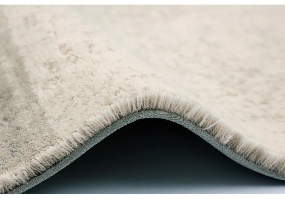 Бежов вълнен килим 133x190 cm Agnus Pavement – Agnella