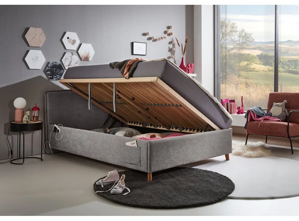 Сиво тапицирано детско легло 120x200 cm с място за съхранение с включена подматрачна рамка Fun – Meise Möbel
