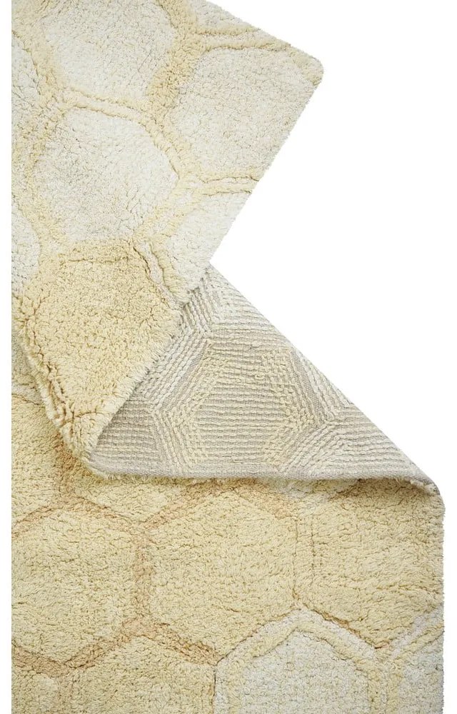 Ръчно изработен памучен килим подходящ за пране в цвят жълта охра 140x200 cm Sweet Honey – Lorena Canals