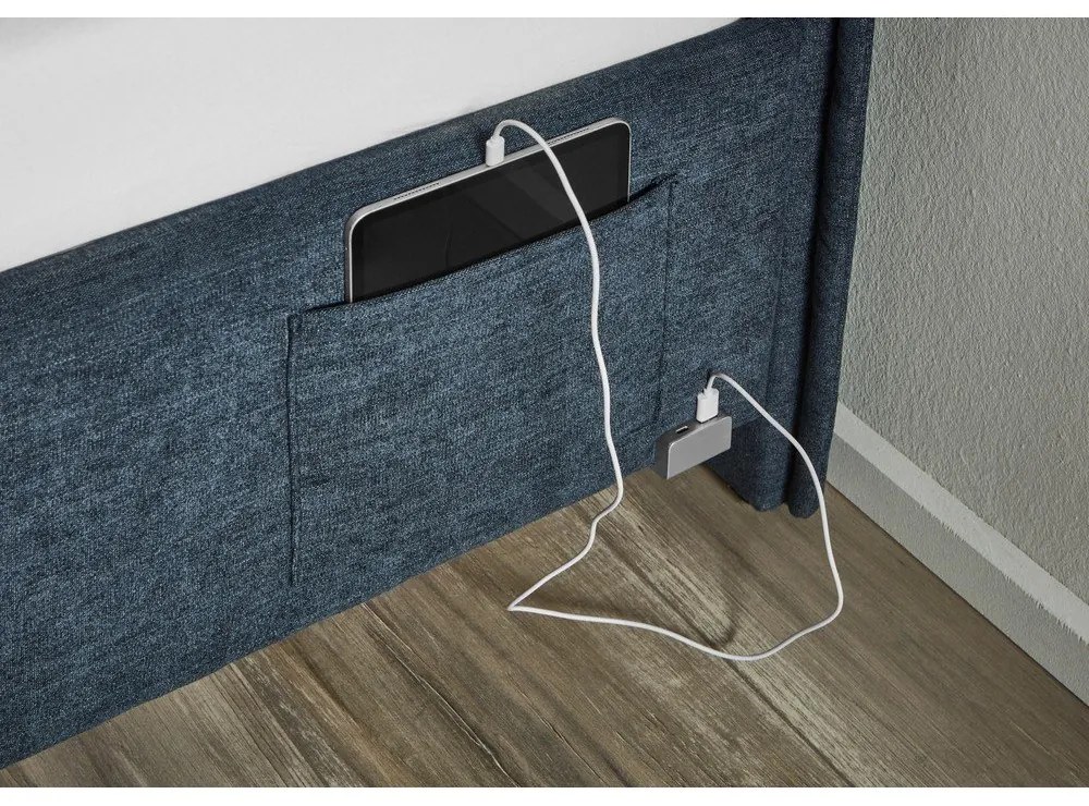 Тъмносиньо тапицирано детско легло 90x200 cm с място за съхранение с включена подматрачна рамка Fun – Meise Möbel