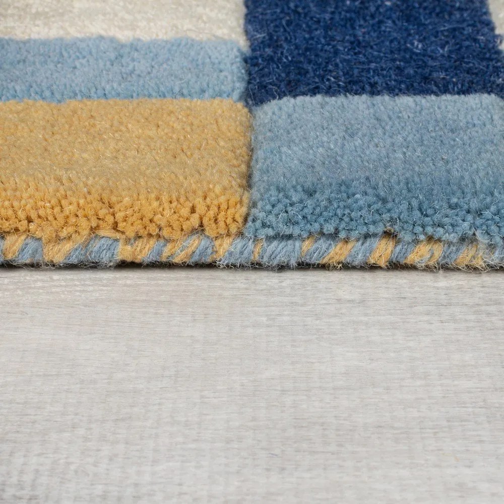 Син ръчно изработен вълнен килим 120x170 cm Kai Wool Border – Flair Rugs