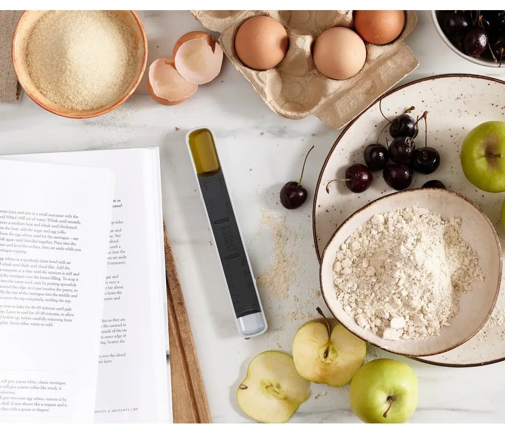 Синя регулируема мерителна чаша Measure-Up - Joseph Joseph