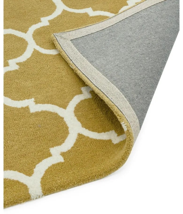 Ръчно изработен вълнен килим в цвят жълта охра 160x230 cm Albany – Asiatic Carpets