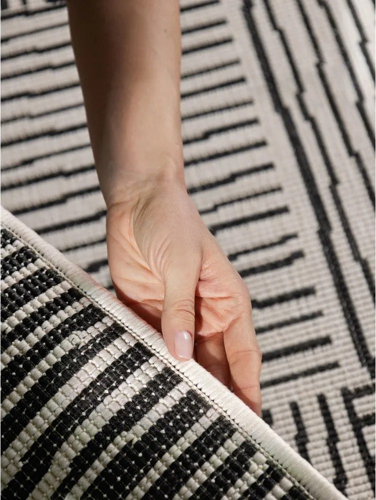 Черен/кремав килим за открито и закрито 120x170 cm Haringey Nightingale – Ted Baker