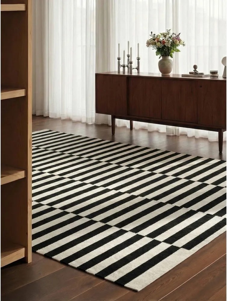 Черно-бял двустранен ръчно изработен вълнен килим 200x300 cm Donna – Hanse Home