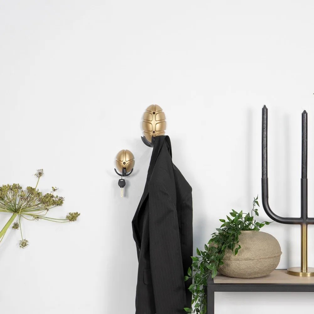 Черна/ в златист цвят стенна пластмасова кука Tick – Spinder Design