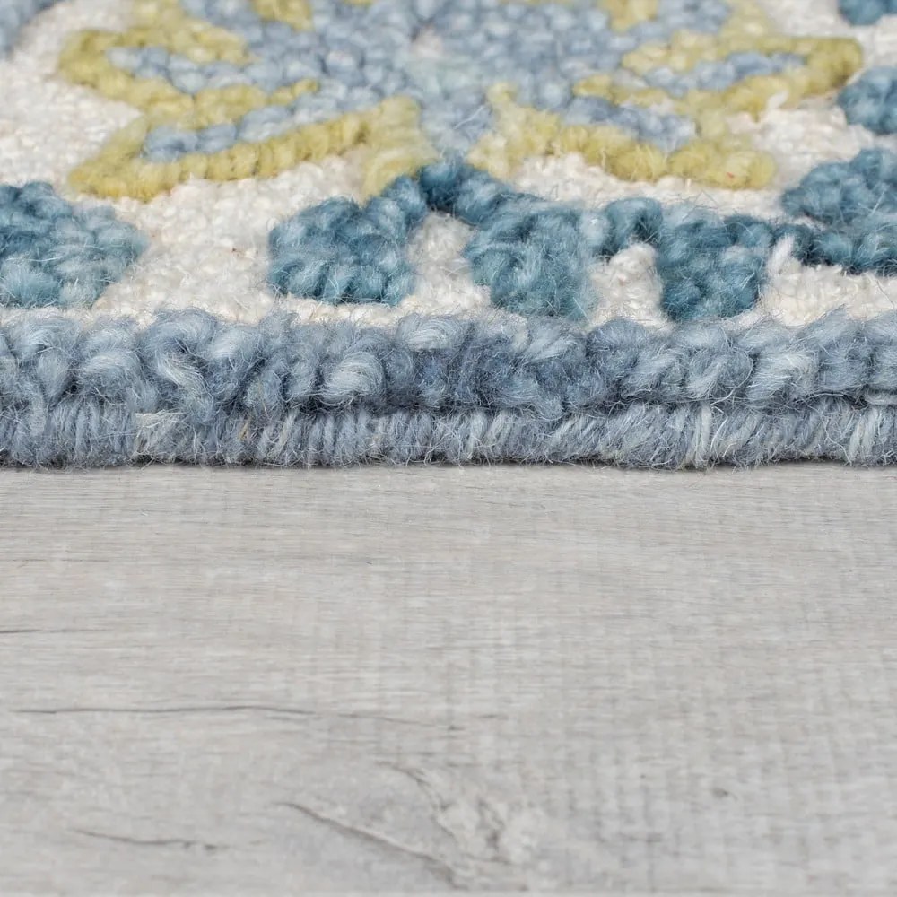 Ръчно изработен килим със смес от вълна в синьо и цвят слонова кост 120x170 cm Myla Floral Frame – Flair Rugs