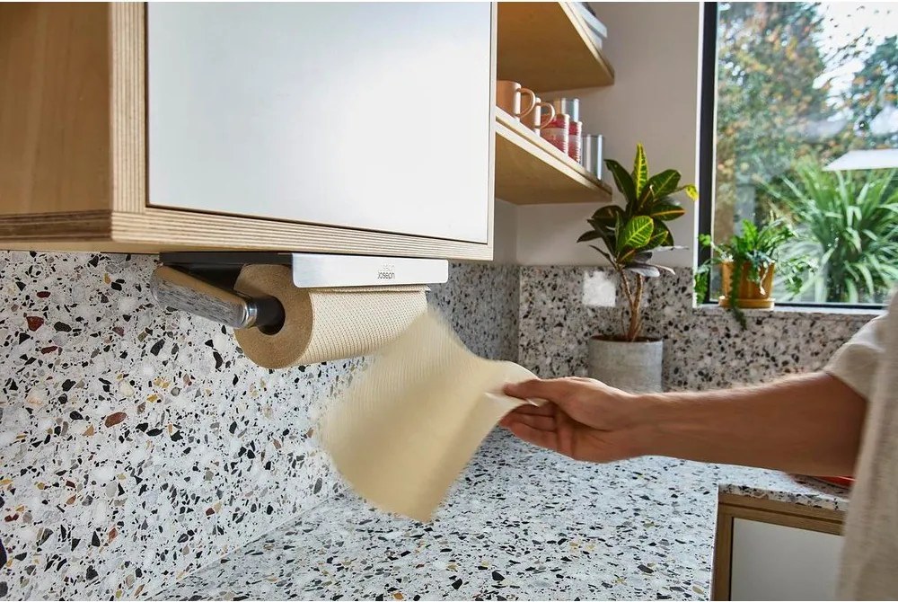 Стенен пластмасов държач за кухненска хартия в сребрист цвят RollGrip – Joseph Joseph