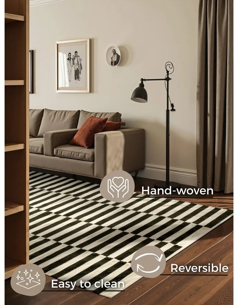 Черно-бял двустранен ръчно изработен вълнен килим 200x300 cm Donna – Hanse Home