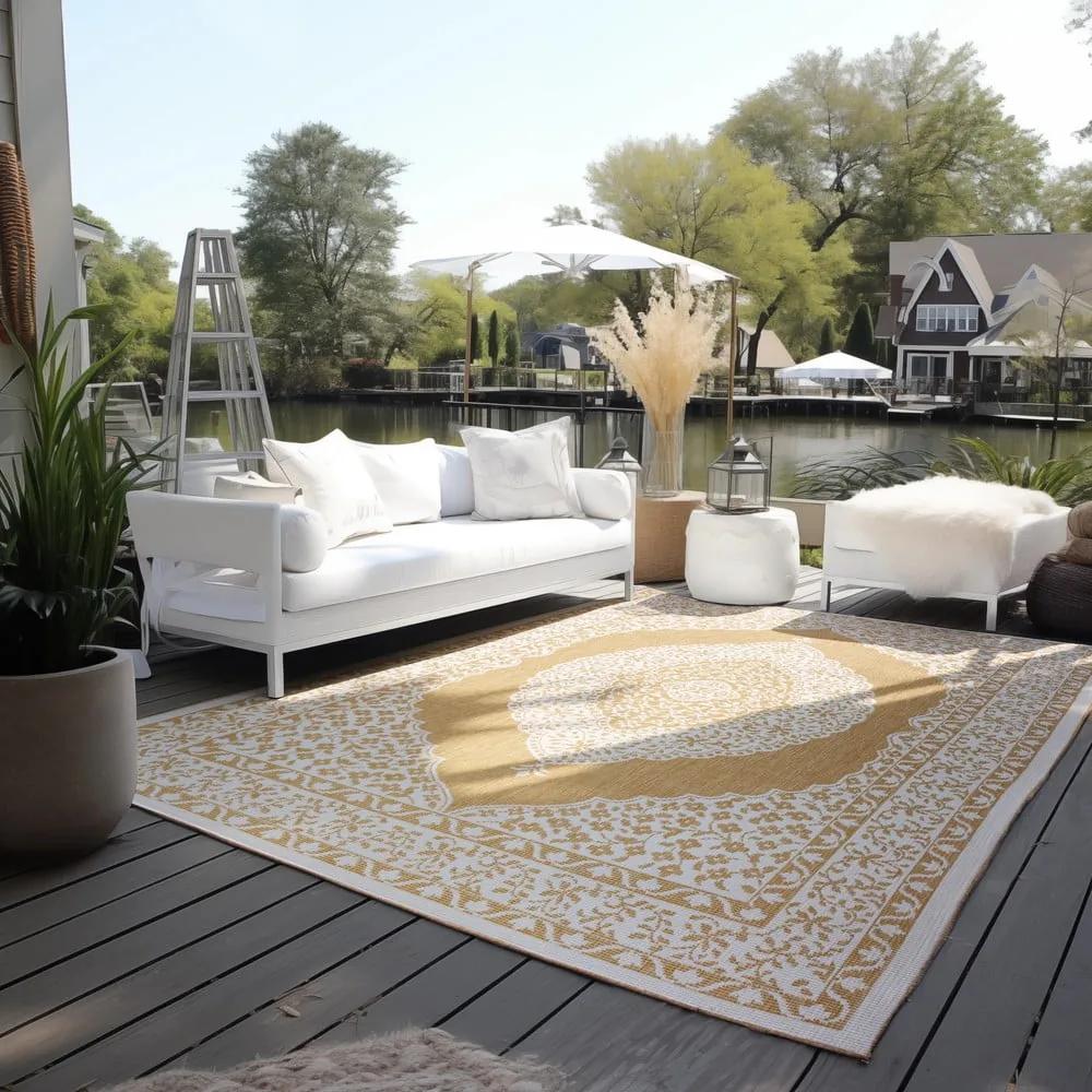 Външен килим в цвят жълта охра и кремаво 80x150 cm Gemini – Elle Decoration