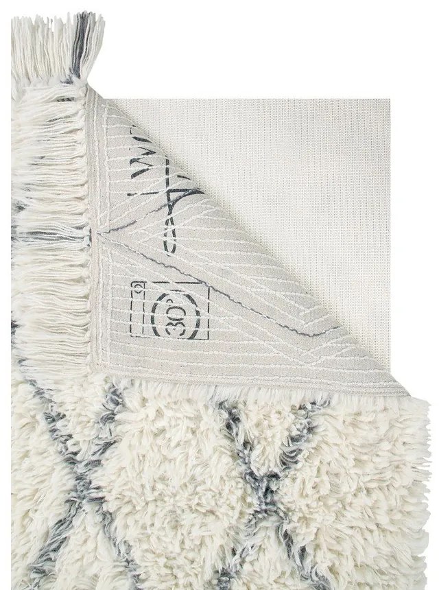 Кремав ръчно изработен вълнен килим подходящ за пране 140x200 cm Berber Soul – Lorena Canals