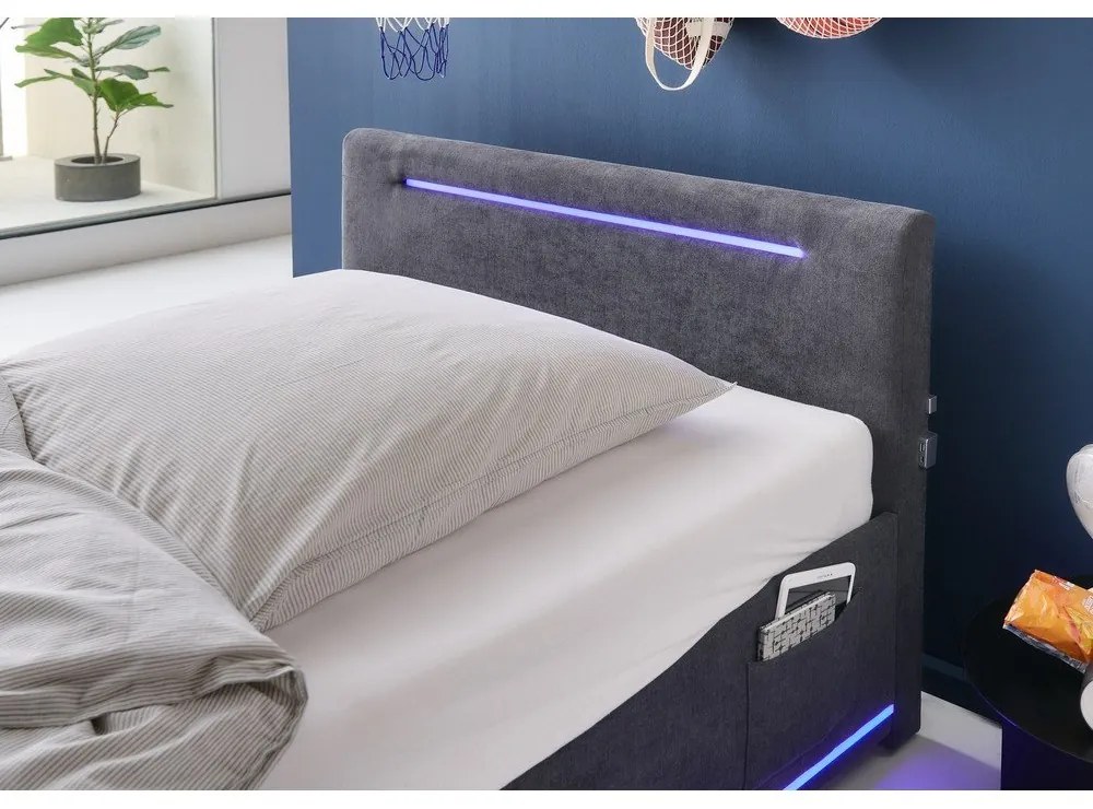 Тъмносиво тапицирано детско легло 120x200 cm с място за съхранение с включена подматрачна рамка Circle – Meise Möbel