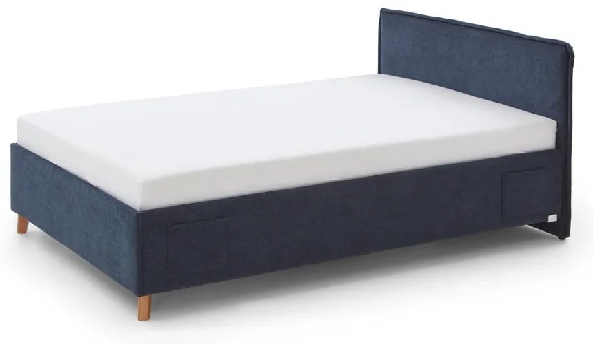 Тъмносиньо тапицирано детско легло 140x200 cm с място за съхранение с включена подматрачна рамка Fun – Meise Möbel