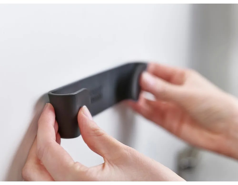 Пластмасови поставка за капаци в комплект 4 бр. без пробиване CupboardStore – Joseph Joseph