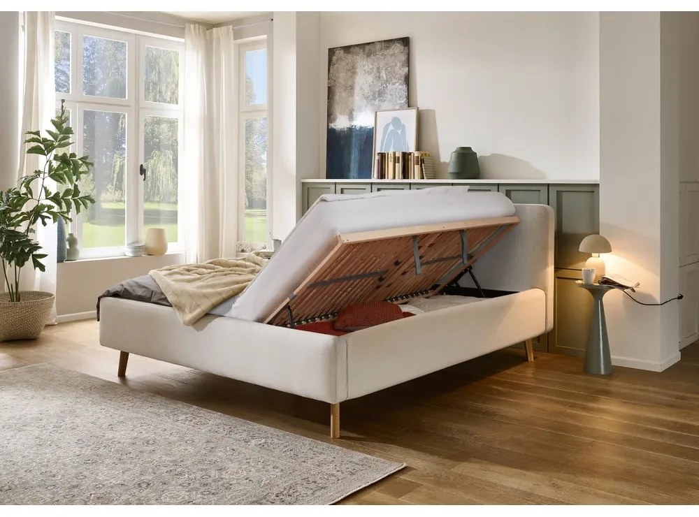 Кремаво тапицирано двойно легло с място за съхранение с включена подматрачна рамка 180x200 cm Mattis – Meise Möbel