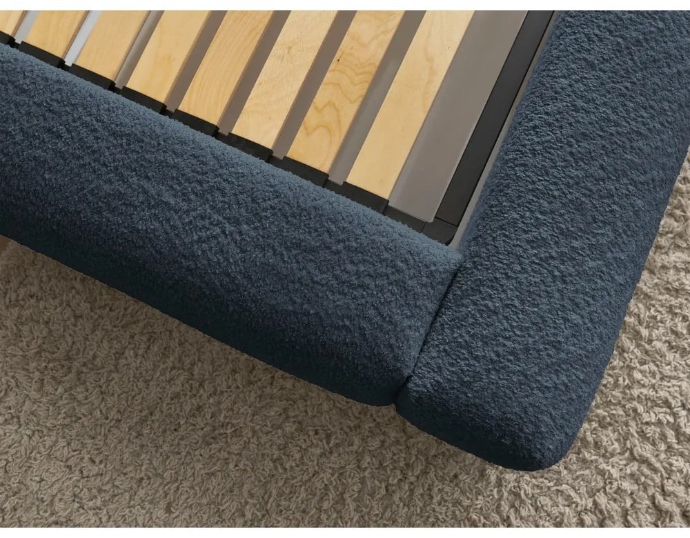 Тъмносиньо тапицирано двойно легло с място за съхранение с включена подматрачна рамка 180x200 cm Orlane – Bobochic Paris