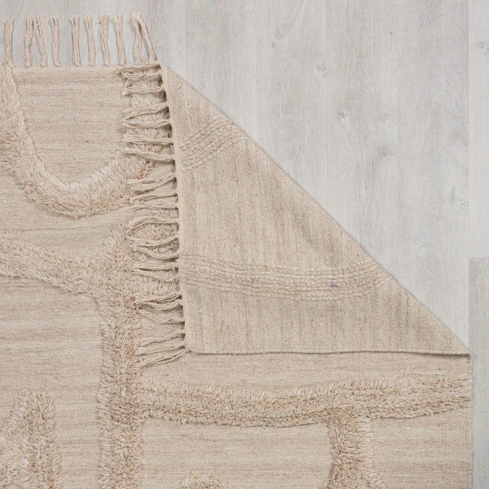 Бежов ръчно изработен вълнен килим 120x170 cm Loma – Flair Rugs