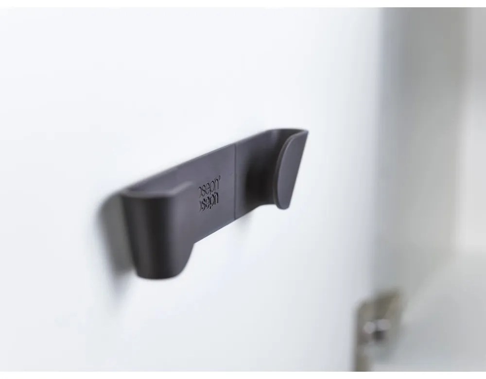 Пластмасови поставка за капаци в комплект 4 бр. без пробиване CupboardStore – Joseph Joseph